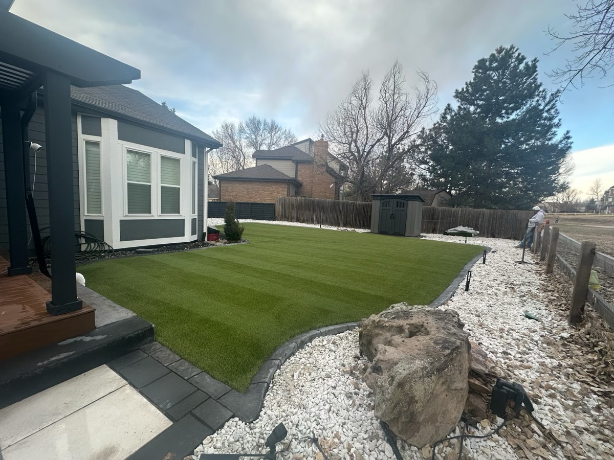 Striped artificial turf backyard in Denver