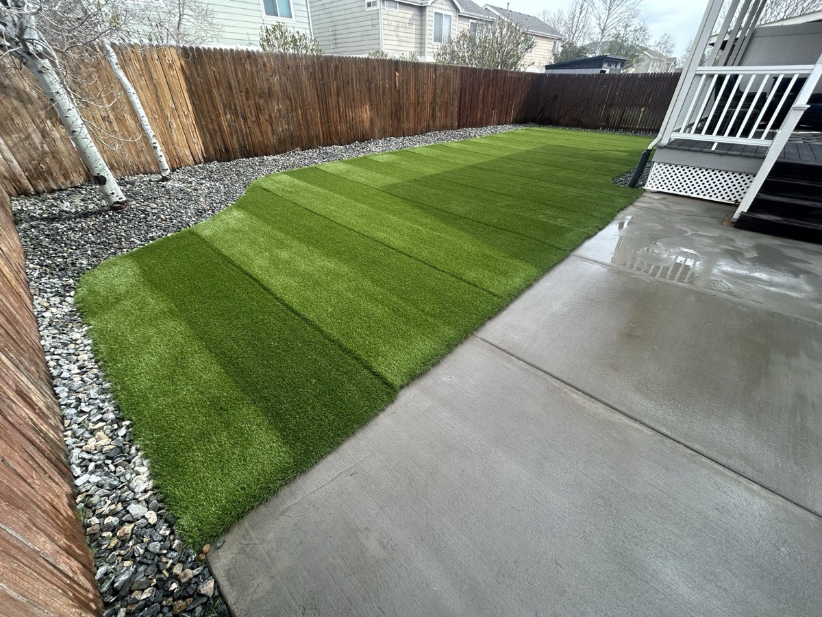 Clean striped residential artificial turf